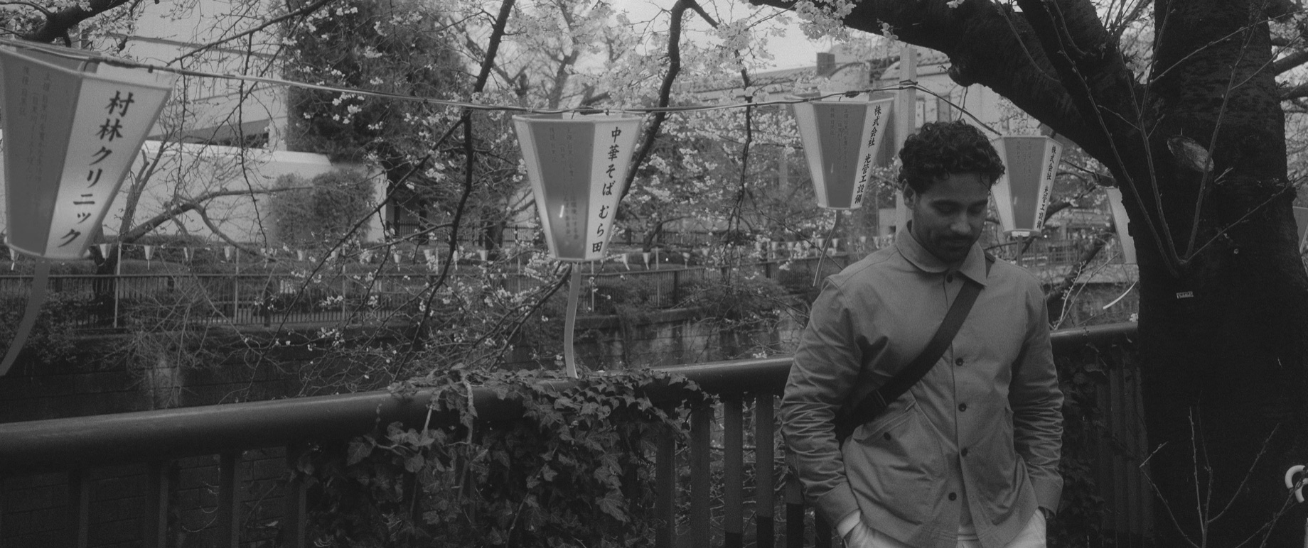 Mohammed Ridwan under cherry blossoms in Tokyo